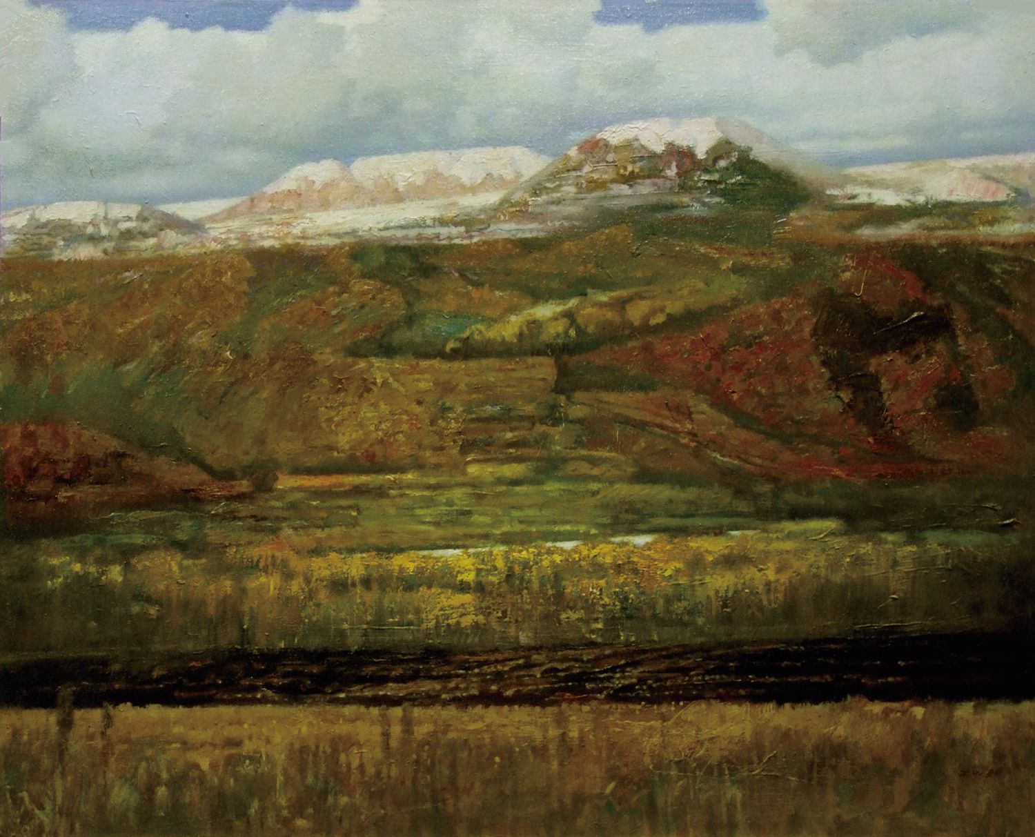 The wheat fields at the foot of the mountain
